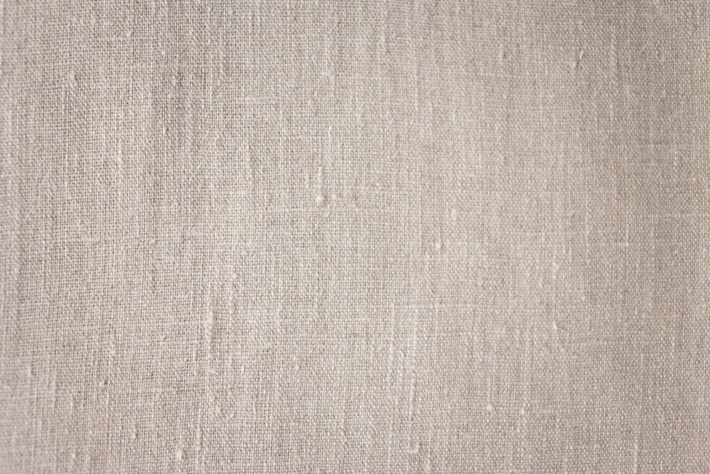 Gros plan sur le tissage d un lin naturel, texture et matière